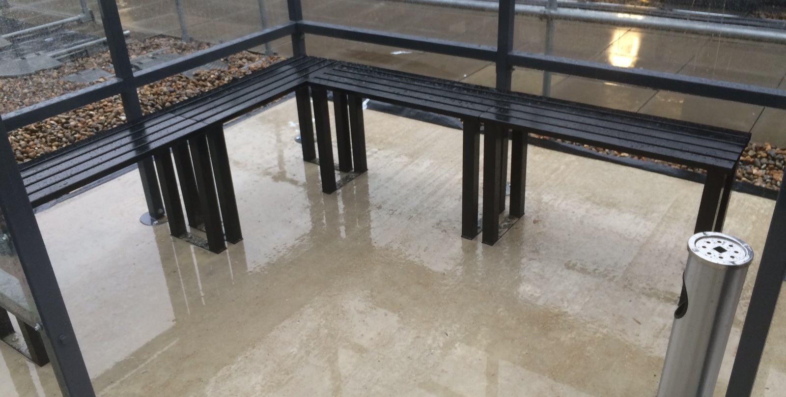 Image of Shelter Store Two Person Seating Benches installed under a shelter