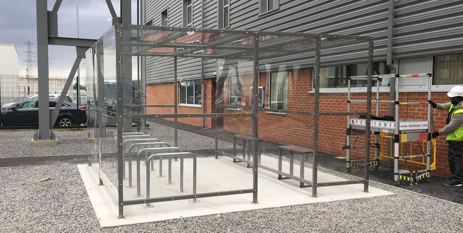 Image of Shelter Store Two Person Seating Benches installed under a shelter