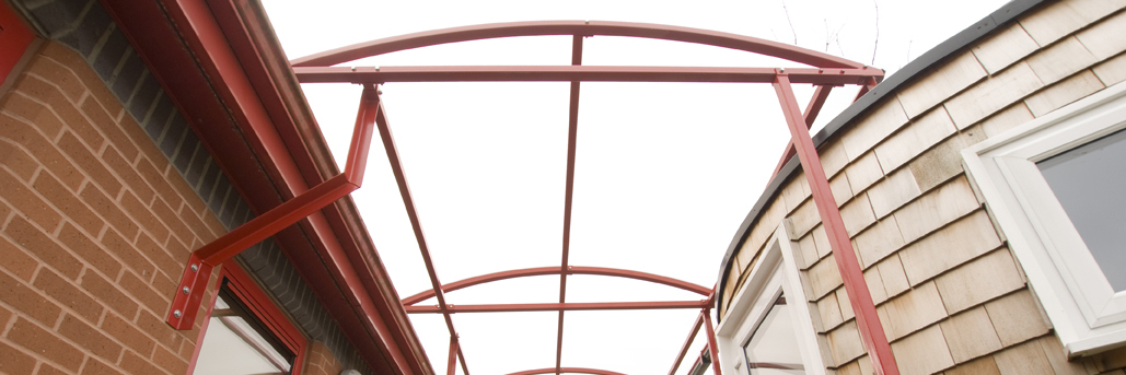 A shelter store walkway canopy installed at a school